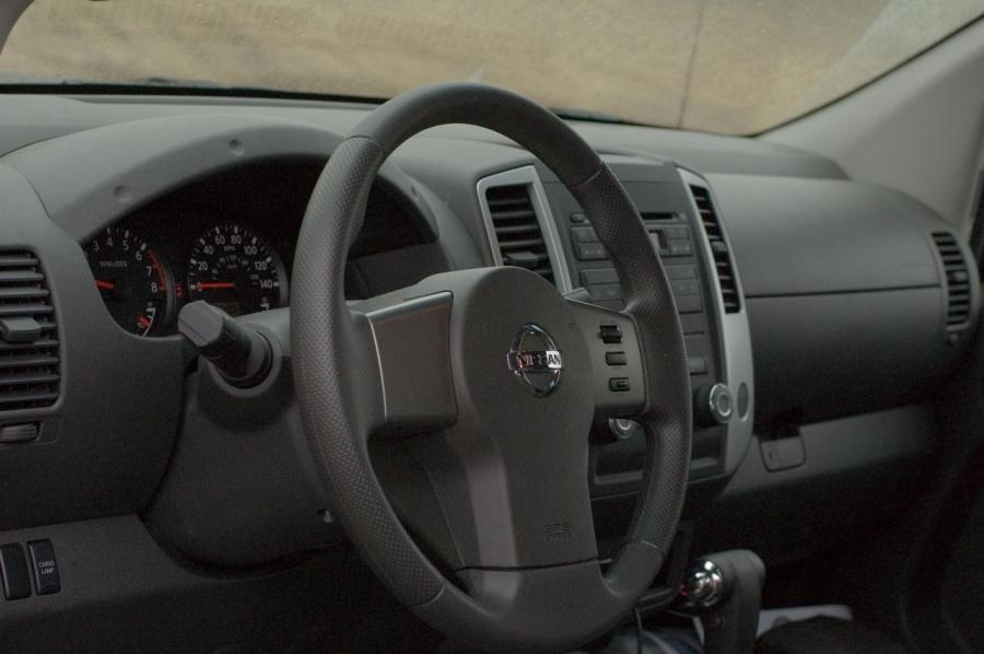  Nissan Frontier 2009 года  (фото 46 из 65)